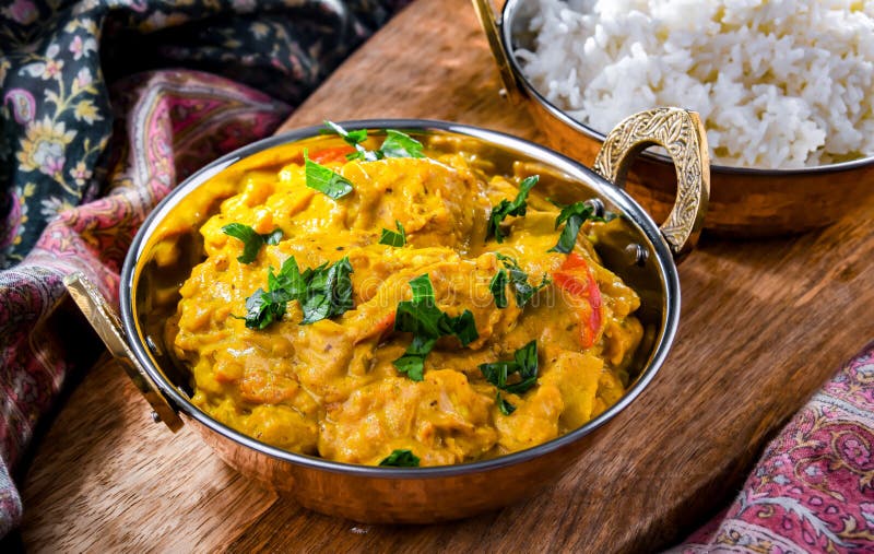 Curry Chicken with Rice Served in Original Indian Karahi Pots Stock ...