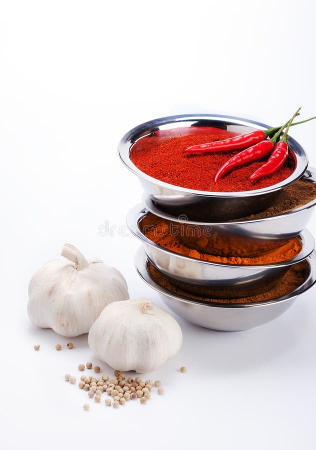 Curry Powder in Bowl Stack with Chili ,garlic,pepper Ingredients Stock