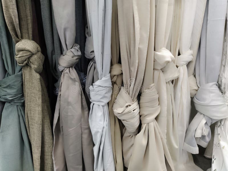 Curtain and Fabric for Drapery and Interior Decoration. Samples of Gray