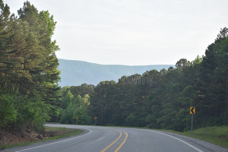 This is Hwy 259 headed South toward Beavers Bend in Oklahoma. Eastern Oklahoma and Western Arkansas has some great Country for a great getaway drive. This is Hwy 259 headed South toward Beavers Bend in Oklahoma. Eastern Oklahoma and Western Arkansas has some great Country for a great getaway drive.