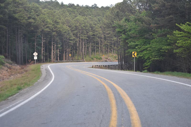 This is Hwy 259 headed South toward Beavers Bend in Oklahoma. Eastern Oklahoma and Western Arkansas has some great Country for a great getaway drive. This is Hwy 259 headed South toward Beavers Bend in Oklahoma. Eastern Oklahoma and Western Arkansas has some great Country for a great getaway drive.