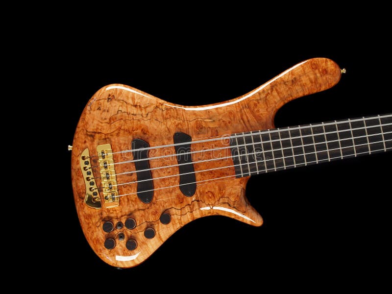 Curved patterned wood bass guitar body on black