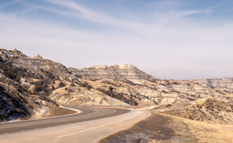 Curving blacktop through canyons