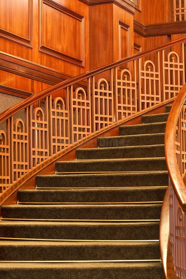 Curving Stairs with Green Carpet stock images Curving Stairs with Green Carpet stock images