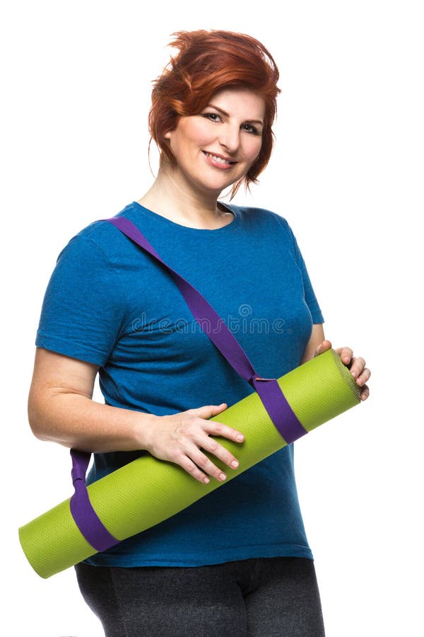 Curvy Woman With Raven Hair In Trendy Combidress Posing Against Blue Background Stock Image