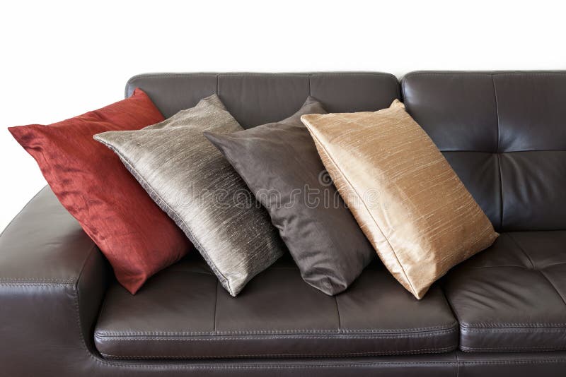 Cushions on leather sofa stock image. Image of cushions 34236613