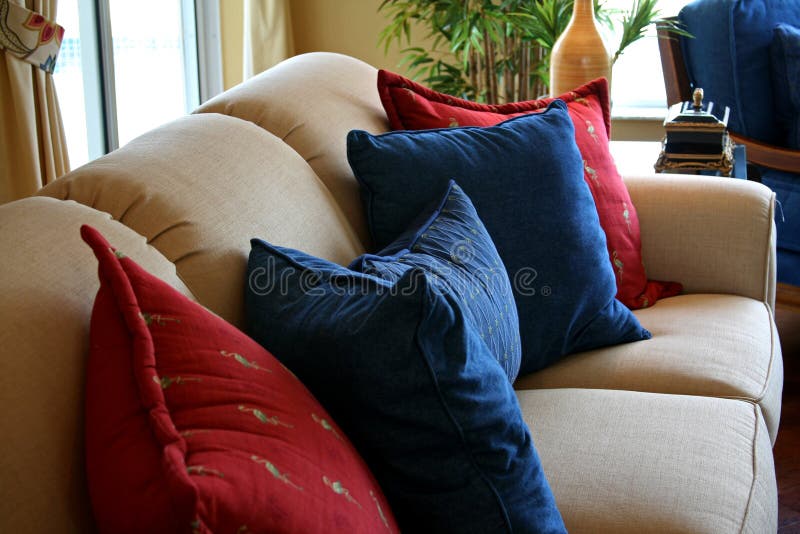 Cushions resting on formal couch in modern home