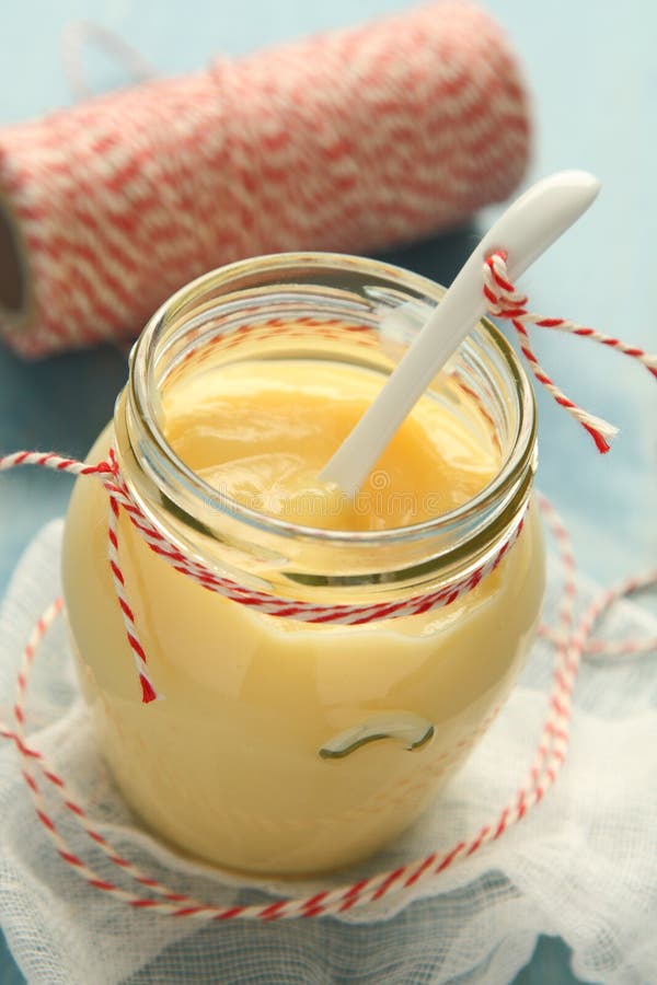 Custard Cream in Glass Jar with White Ceramic Spoon Stock Image Image
