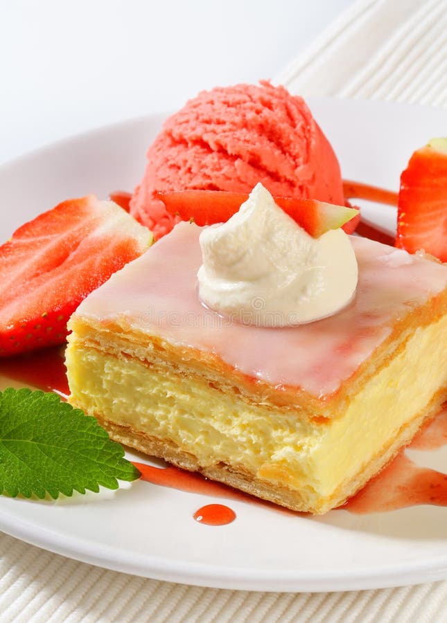 Custard (Vanilla) Slice with Strawberries and Ice Cream Stock Photo