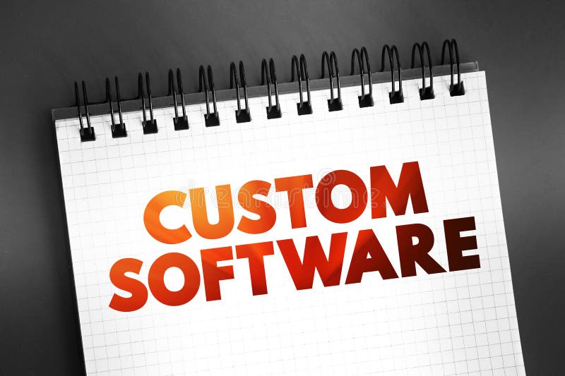 Custom software is software that is specially developed for some specific organization or other user, text concept on notepad stock photography