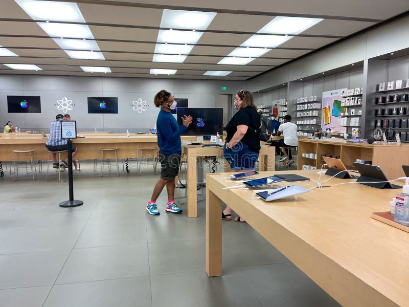 A Customer at an Apple Store Being Helped by an Apple Employee at an Apple  Store Editorial Stock Photo - Image of macbook, ipad: 235899068