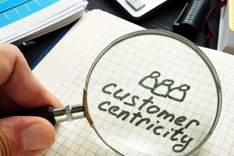 Customer centricity handwritten in a note pad. stock photography Customer centricity handwritten in a note pad. stock photography