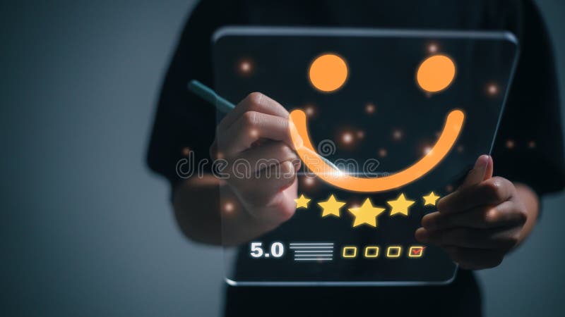 The customer creates a happy face smiling symbol using a digital pen on a futuristic virtual interface screen. The consumer royalty free stock photo