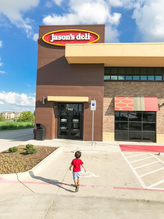 Customer enter Jason Deli restaurant chain in Lewisville, Texas, USA royalty free stock photography Customer enter Jason Deli restaurant chain in Lewisville, Texas, USA royalty free stock photography