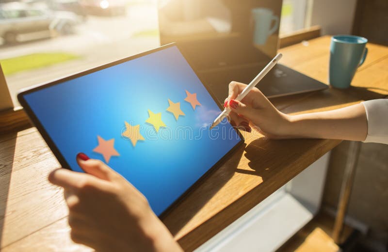 Customer experience satisfaction, feedback, review. Stars icon on device screen.