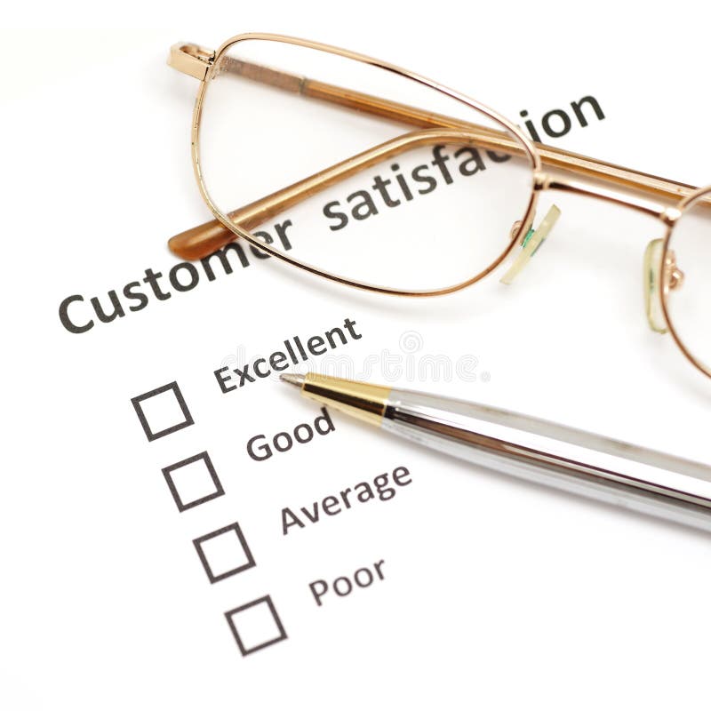 Customer satisfaction survey form with pen and eye glasses.