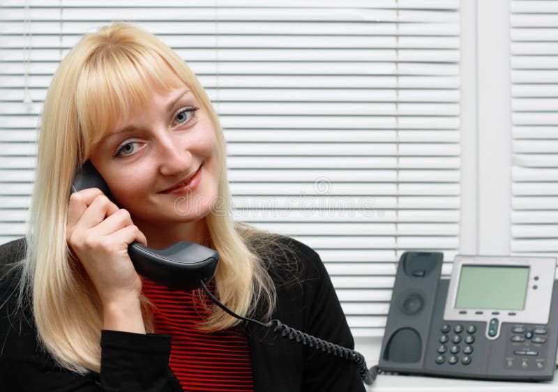 Customer service operator with a digital IP phone