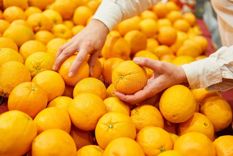 Customer in the Supermarket Shopping for Oranges Stock Photo Image of
