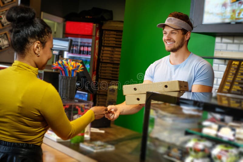 Customer woman takes his order in a pizzeria. royalty free stock image Customer woman takes his order in a pizzeria. royalty free stock image