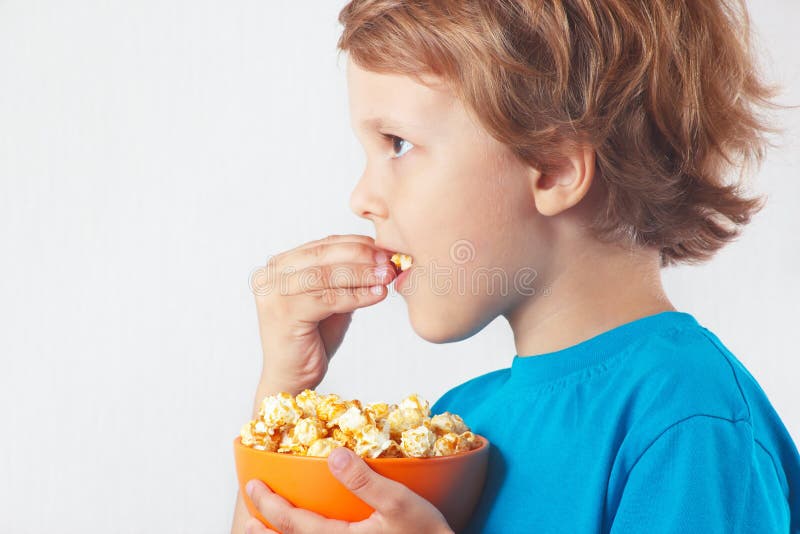 Cut Child Eating Popcorn Stock Photos Free & RoyaltyFree Stock