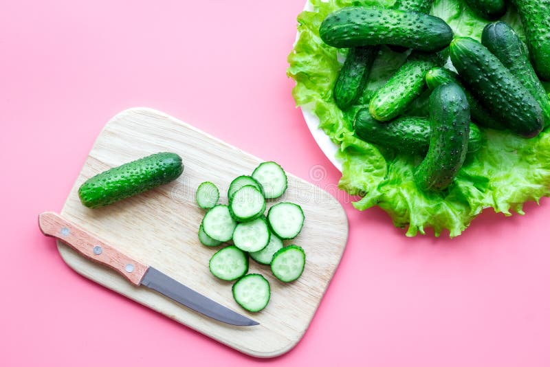 Cut Fresh Cucumbers. Pink Background Top View Stock Photo Image of