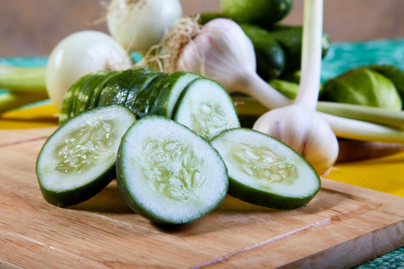 The cut green cucumber with garlic