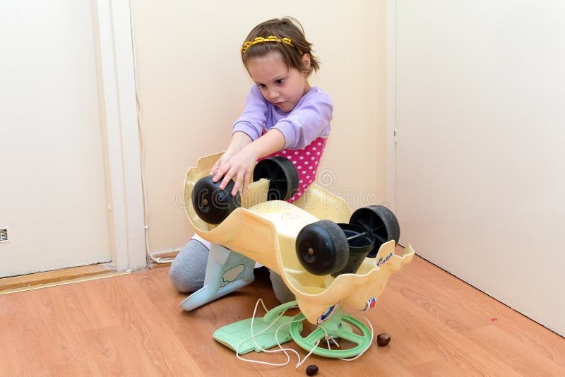 Cut Little Girl Fixing Toy Car Stock Photo Image of industry, girl