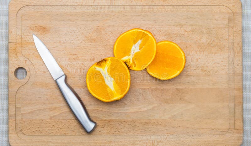 Cutted Orange on a Wooden Board Stock Photo - Image of orange, natural ...