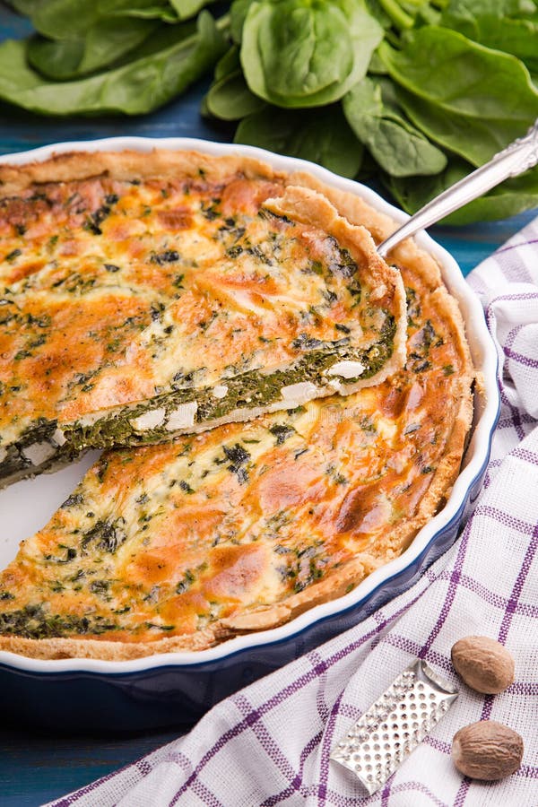 Cut Piece of Homemade Spinach Quiche Lorraine Stock Photo - Image of ...