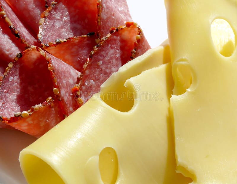 Cut salami and cheese stock image. Image of hole, snack 6531673