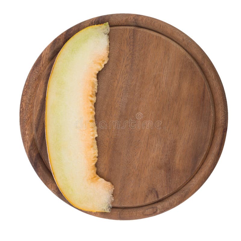 Cut a slice of juicy melon on a cutting board. royalty free stock photography Cut a slice of juicy melon on a cutting board. royalty free stock photography