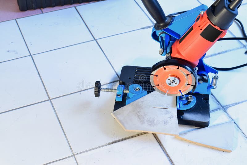 Cut a Tile by Angle Grinder with Circular Saw Blade Stock Photo Image