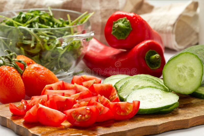 Cut vegetables stock image. Image of knife, wooden, peppers 23963223