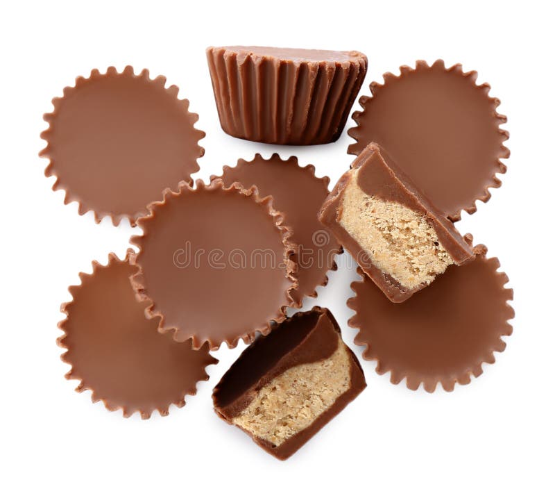 https://thumbs.dreamstime.com/b/cut-whole-delicious-peanut-butter-cups-white-background-top-view-cut-whole-delicious-peanut-butter-cups-white-214105325.jpg