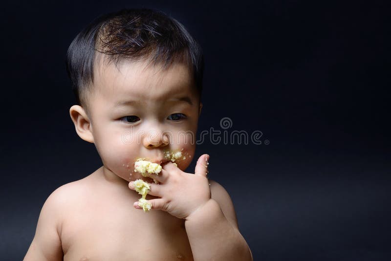 Cute Asian Baby Eating Cake with His Hand Stock Image Image of tasty