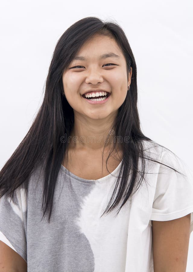 Cute laughing asian girl on isolated background royalty free stock photos Cute laughing asian girl on isolated background royalty free stock photos