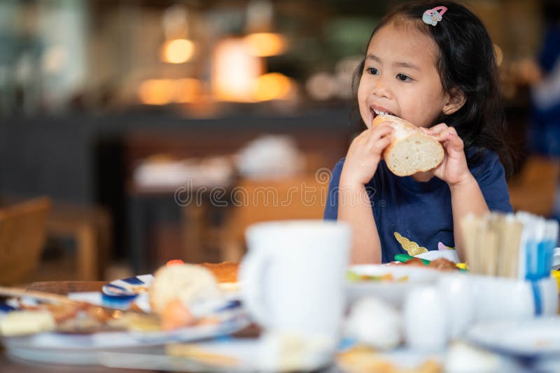 Cute Asian Small Girl Eating a Bread Stock Image Image of fresh, baby