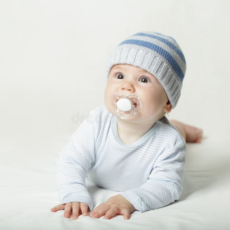 Cute baby in blue clothes stock photo. Image of closeup 48897026