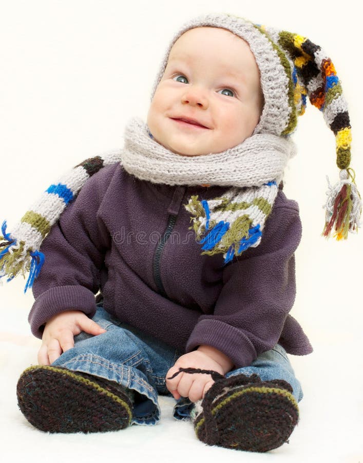 Cute baby boy in knitted handmade wear