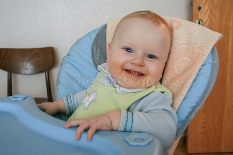 Cute Baby Boy Sitting on the Baby Chair and Waiting Dinner. Stock Image ...