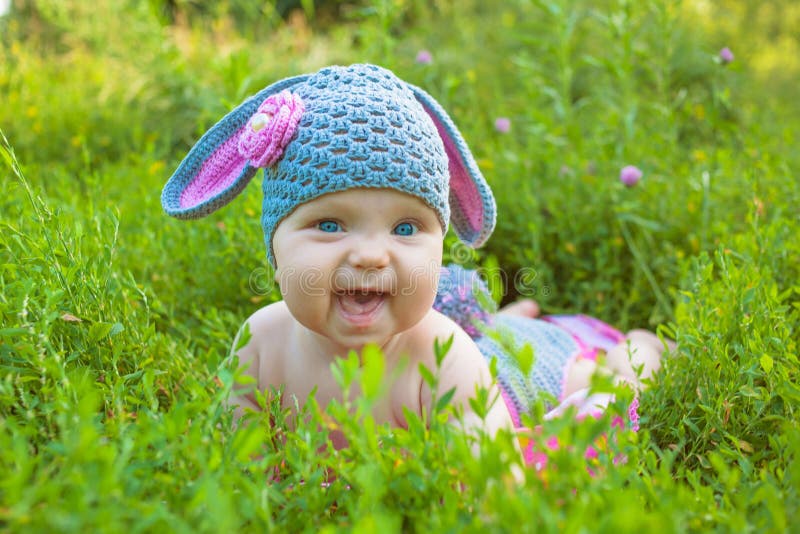 Cute baby in a Easter bunny of lamb costume i