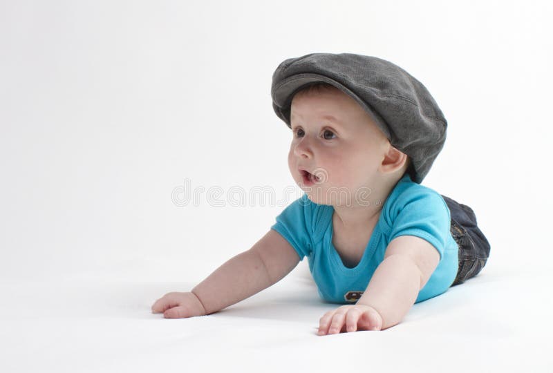Cute baby with flat cap stock image