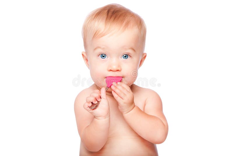 Cute baby with food spoon in mouth stock images Cute baby with food spoon in mouth stock images