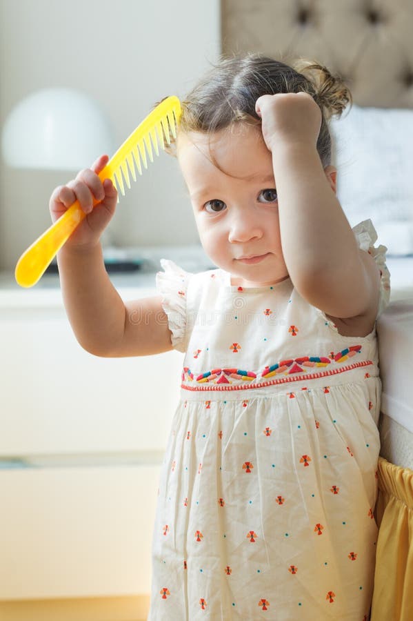 Baby Girl Combing Her Hair in Bedroom Stock Image - Image of bedroom, haircare: 33502715 Baby Girl Combing Her Hair in Bedroom Stock Image - Image of bedroom, haircare: 33502715