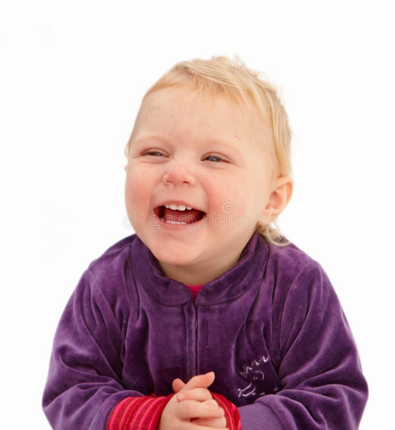 Cute baby girl smiling on white background