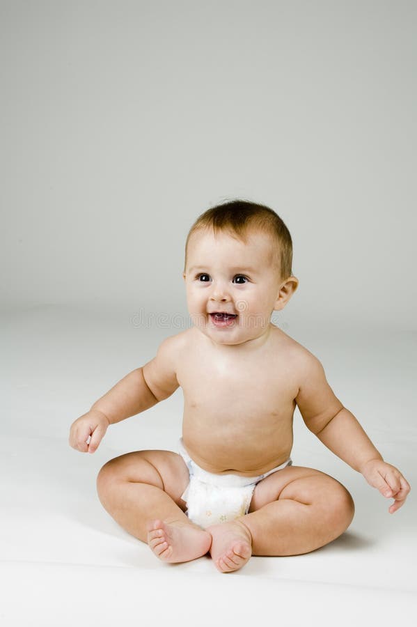 Cute Baby with Happy Face in Diaper.