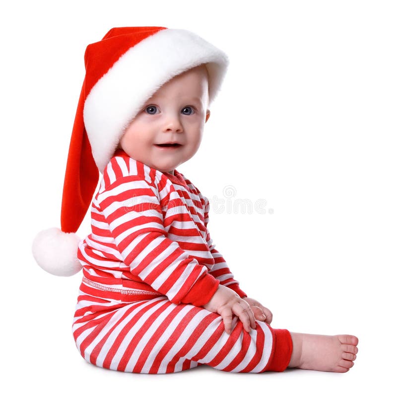 Cute Baby In Santa Hat And Bright Christmas Pajamas On White Background