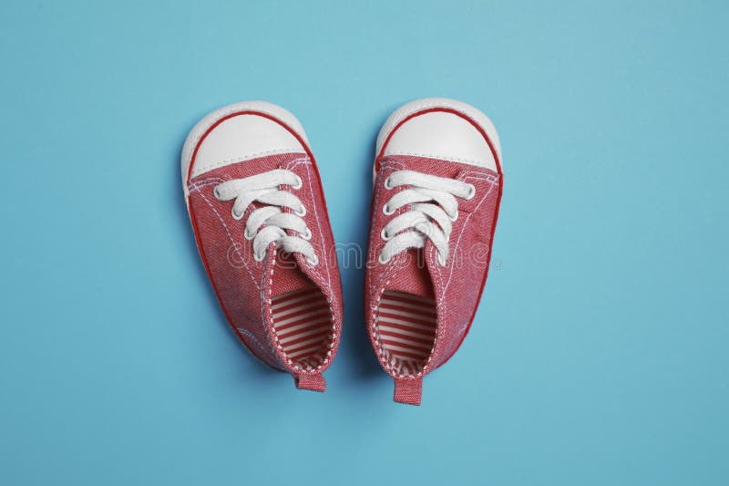 Cute Baby Shoes on Light Blue Background, Flat Lay Stock Photo - Image ...