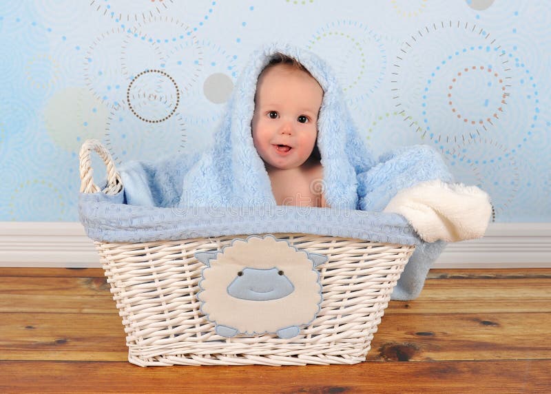 Cute Baby Sitting in Basket with Blanket on Head Stock Photo Image of