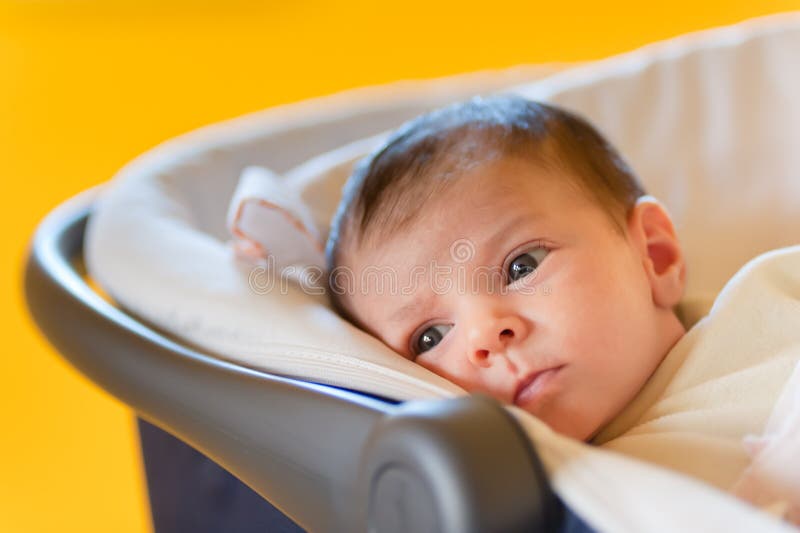 Cute baby in a stroller royalty free stock photography